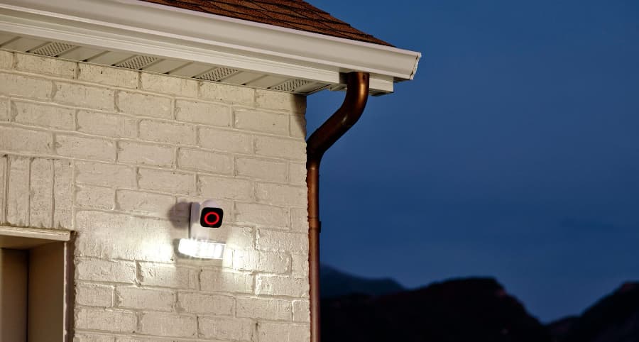 Vivint Spotlight Pro exterior camera seen beside a garage